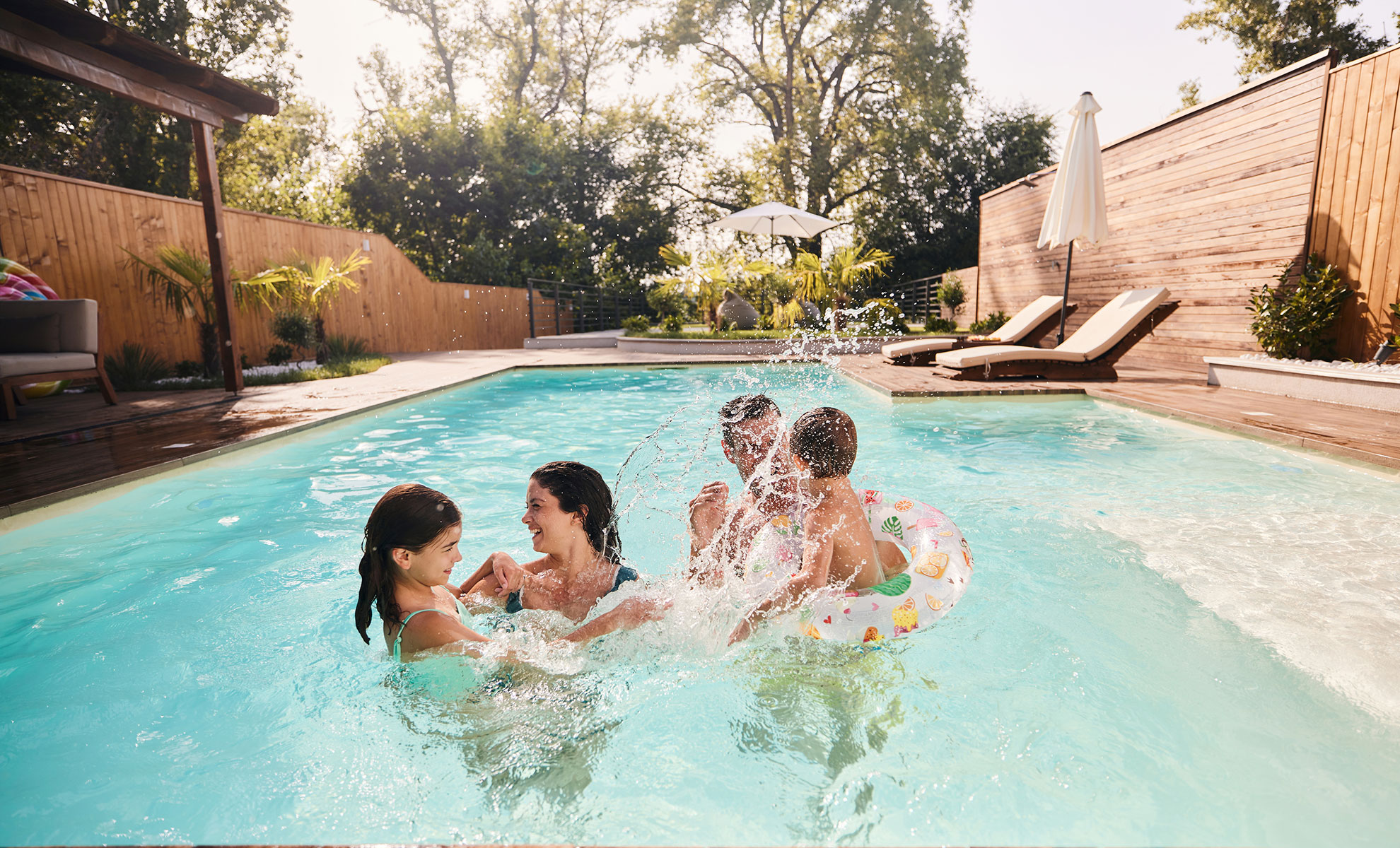 family in pool